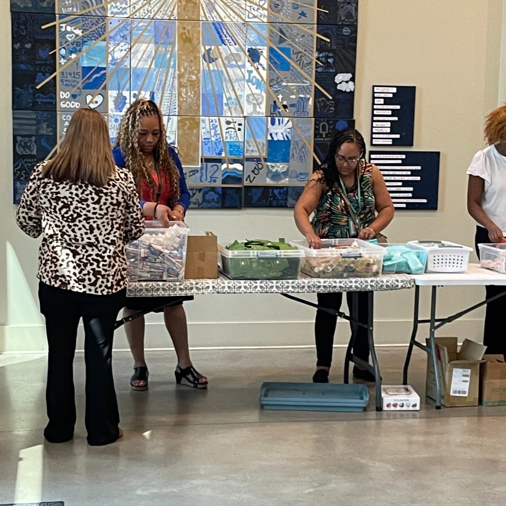 Volunteers packing donation bins for community engagement