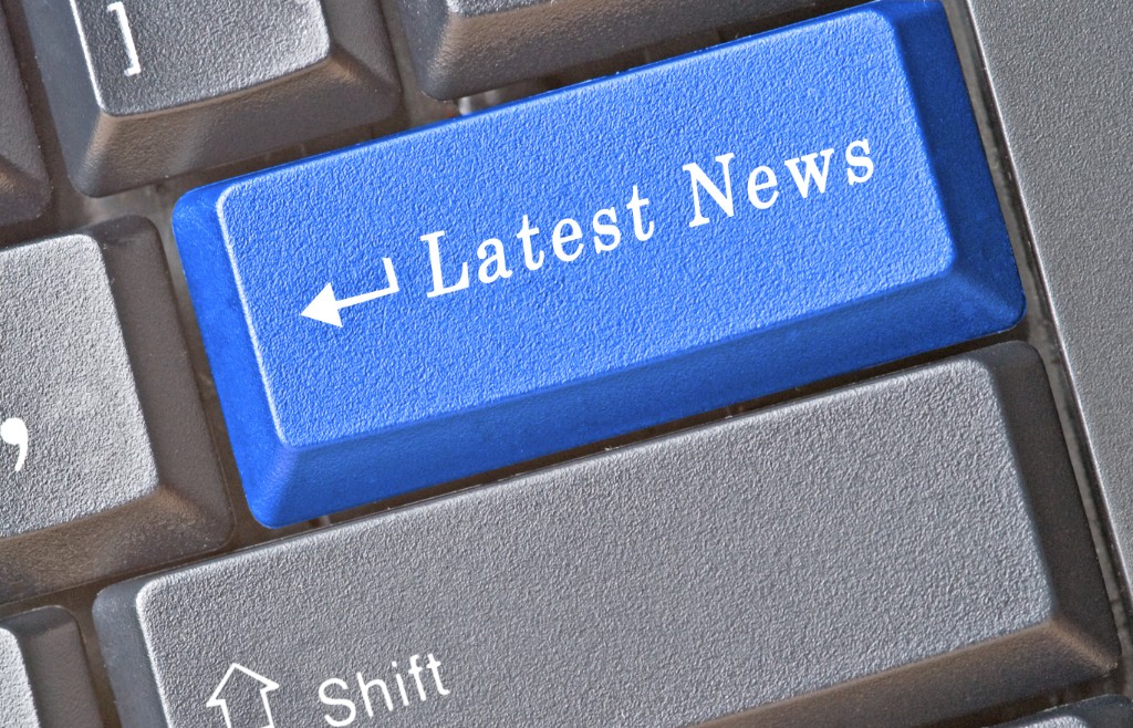 Keyboard key labeled Latest News