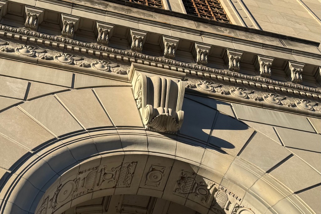 Architectural detail of a classical stone courthouse arch